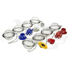 Load image into Gallery viewer, Tea ball infusers. Eight tea balls shown each with different ornament attached to its chain: yellow sunflower, red heart, red tea cup, red tea pot, blue tea cup, blue tea pot, white tea cup, and white tea pot.
