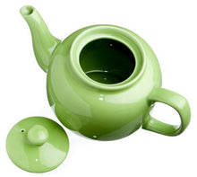 Load image into Gallery viewer, 6 cup ceramic tea pot in a vibrant and cheerful mojito or lime green shown from the top with the lid off and to the side.. Perfect for brewing loose leaf teas. Recommended to use a Paris or London tea strainer along with this tea pot.
