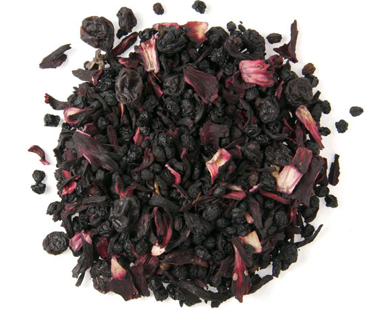 Loose leaf herbal tea blend with pieces of elderberries, currants, and hibiscus petals making a rich fruity herbal tea blend with gorgeous deep purple to red colour