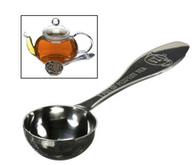 Load image into Gallery viewer, 1 perfect pot of tea stainless steel measuring spoon. Measures a perfect amount of tea for a 3-4 cup pot of tea to brew loose leaf tea. Inlaid picture show clear glass pot of brewed tea with the perfect pot of tea measuring spoon next to it filled with loose leaf tea.
