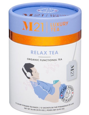 White and blue cardboard cylinder that contains 12 pyramid tea bags with ingredients of Apple pieces, Lemon Verbena, Lemongrass, Hibiscus, Lemon pieces, Raspberry pieces, and Cornflower petals. Package reads M21 Luxury Tea. Relax Tea Organic functional tea. Tea bags are plant based with no plastic. Picture on package is of male with dark hair wearing blue tea shirt, reclining, while listening to headphones and drinking tea.