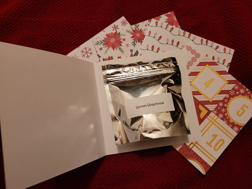 A blank Christmas card with a silver package of loose leaf tea inside. The card is ready for you to write a lovely message to your tea loving friend! Several different flavours of tea available.